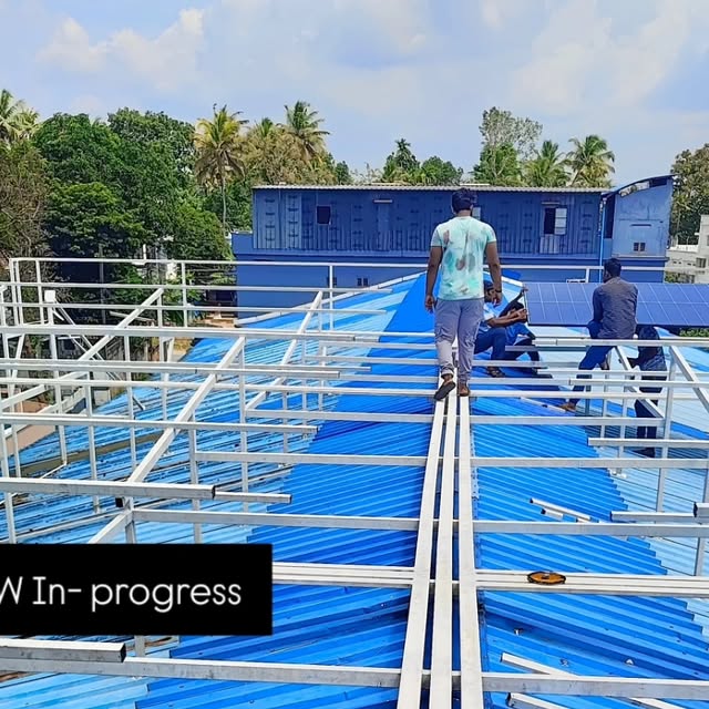 Rooftop solar installation in progress by Teche Center